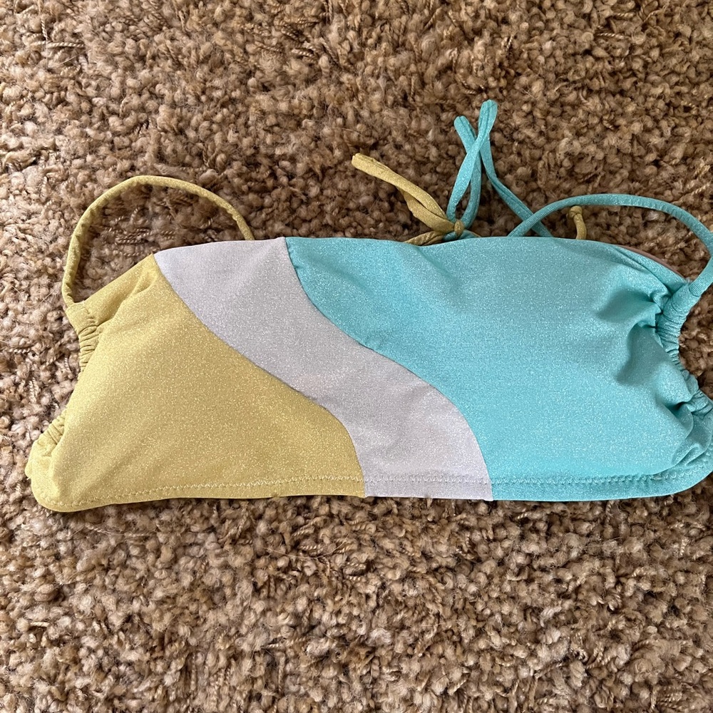 NWOT PQ swim Luna wave top. Metallic shimmer.Size Large. Never worn.